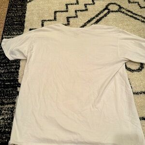 White champion, Blue champion symbol, Champion symbol on sleeve